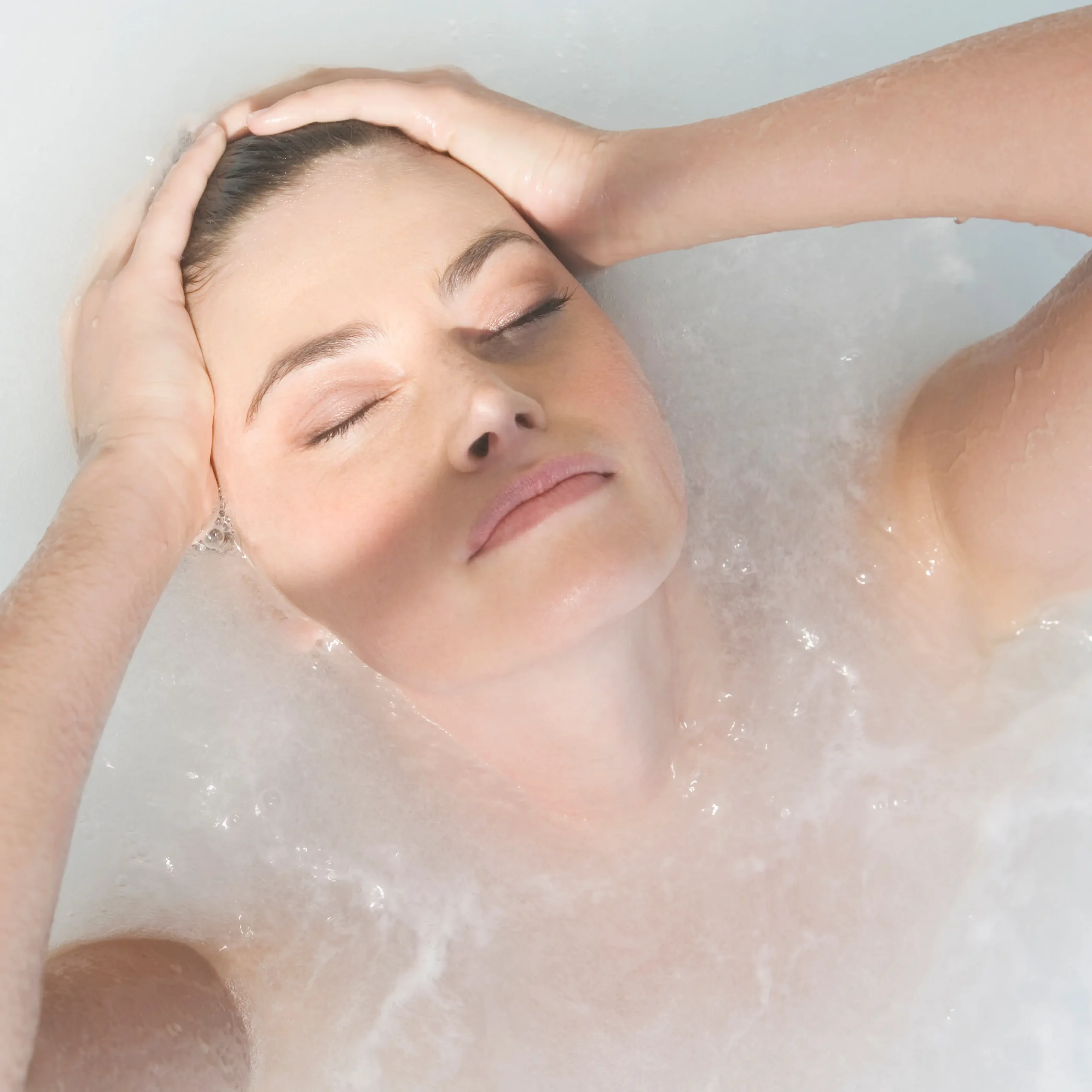 a-woman-relaxing-in-a-jacuzzi-2026-01-11-09-37-55-utc